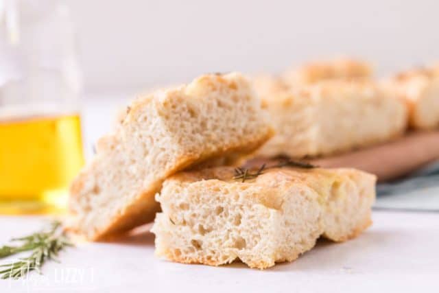 two slices of no knead focaccia bread