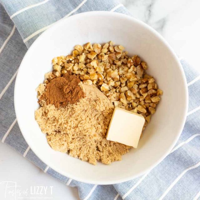 butter, sugar, cinnamon and nuts in bowl