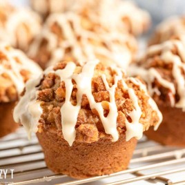 muffins sitting on a wire rack