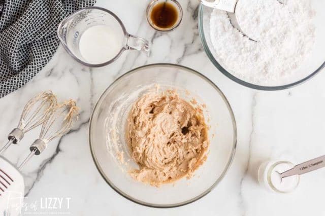 mixing cinnamon frosting