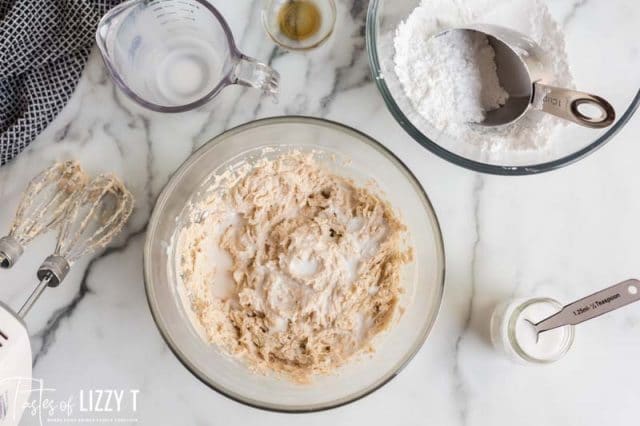 making cinnamon frosting in a bowl