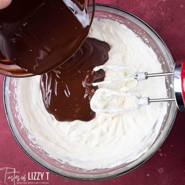 pouring chocolate into cheesecake batter
