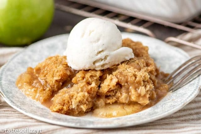 apple crisp with ice cream on a plate