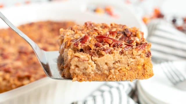 pecan pumpkin dump cake on a spatula