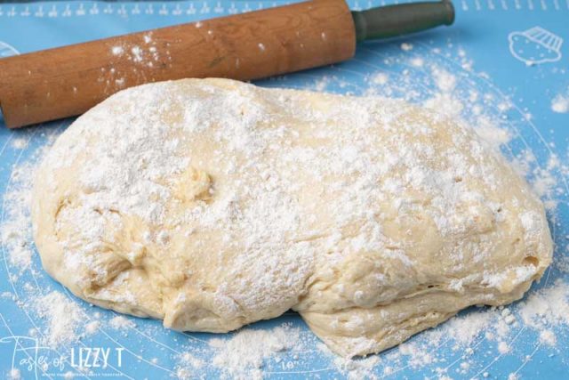 sweet roll dough on a pastry mat