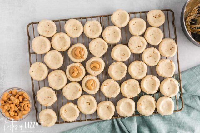 caramel in cookies with a cashew on top
