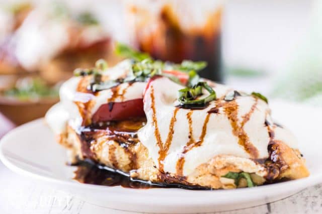 slice of chicken caprese on a plate