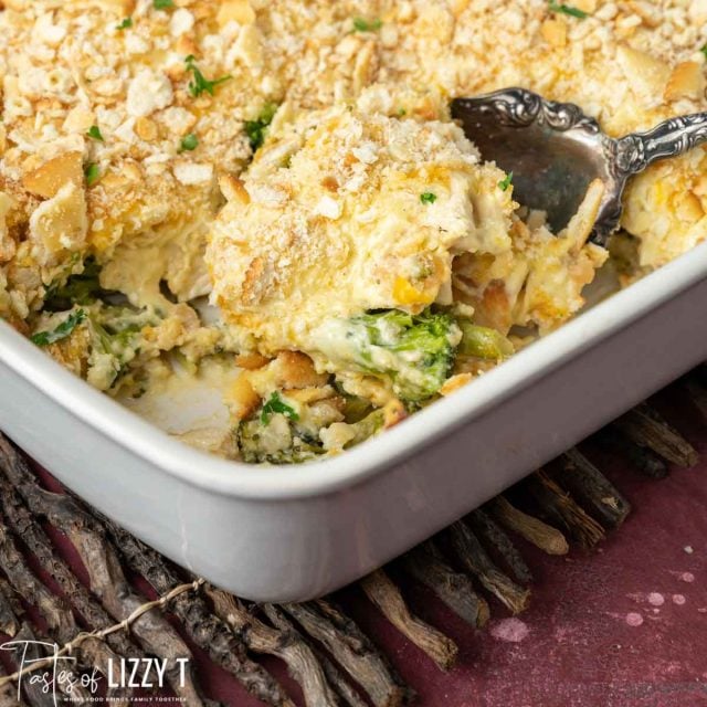 chicken casserole in pan with a serving spoon