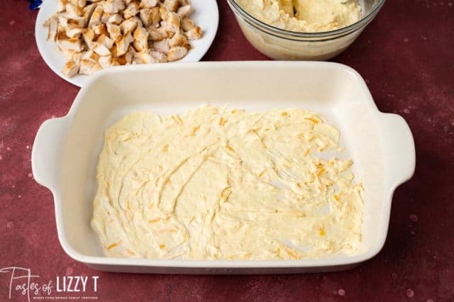 casserole pan with cream spread in the bottom