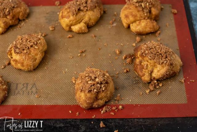 unbaked pumpkin rolls with cinnamon crunch topping