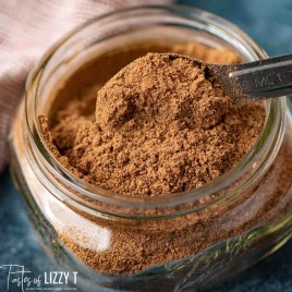chai spice in a jar with a spoon