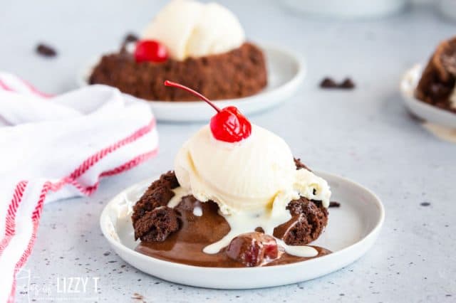 chocolate cherry lava cake with ice cream on a plate