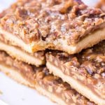 stack of pecan bars with bite out of one