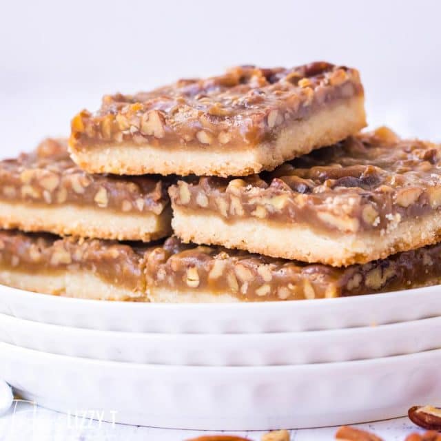 stack of pecan bars on a plate