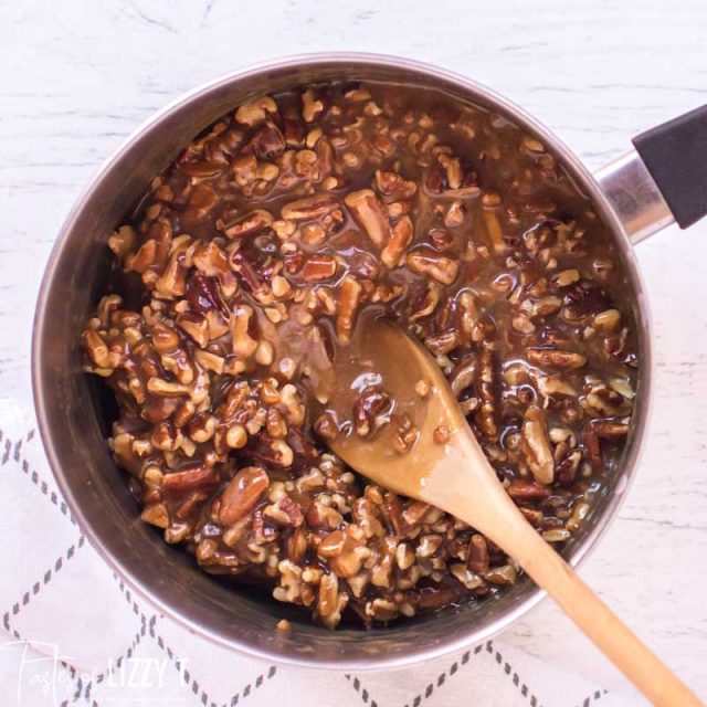 caramel and pecans in saucepan