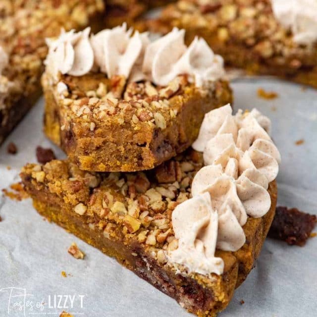 two slices of pumpkin pecan cookie pie