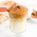 cup of pumpkin spice dalgona coffee