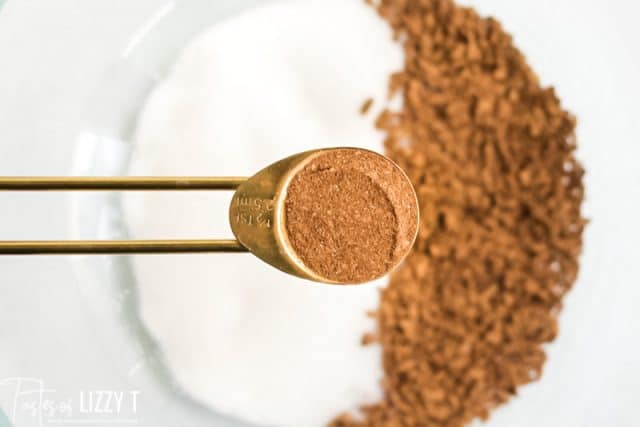 pumpkin pie spice in a measuring spoon