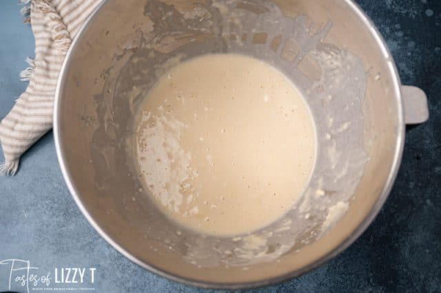 yeast mixture in a metal bowl