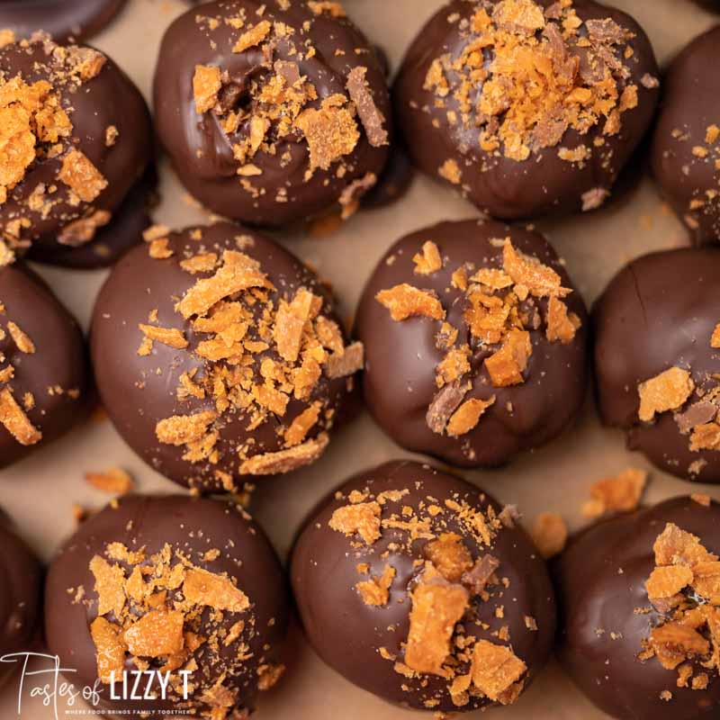 closeup of butterfinger truffles on parchment paper