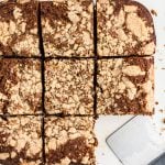 sliced gingerbread streusel cake with one slice missing