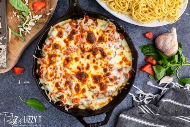 italian chicken with cheese in a skillet