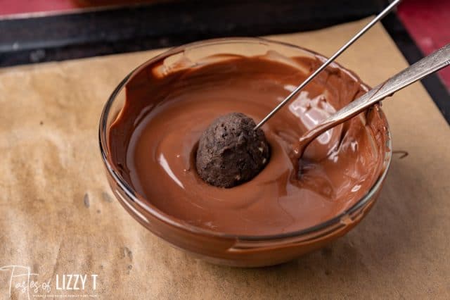 dipping peppermint truffles in chocolate