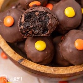 bowl of reese's truffles, one with a bite out