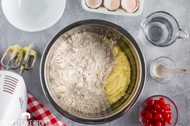 flour and creamed butter in a mixing bowl