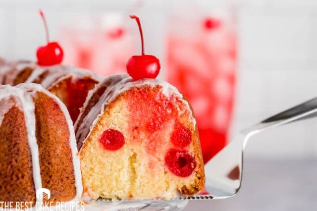 slice of cherry 7up cake on a plate