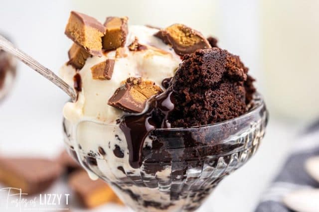close up of brownies and ice cream in a parfait dish