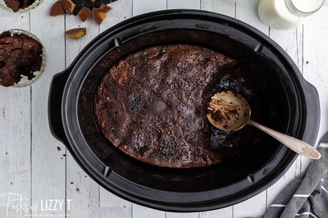 slow cooker peanut butter brownies with a spoon