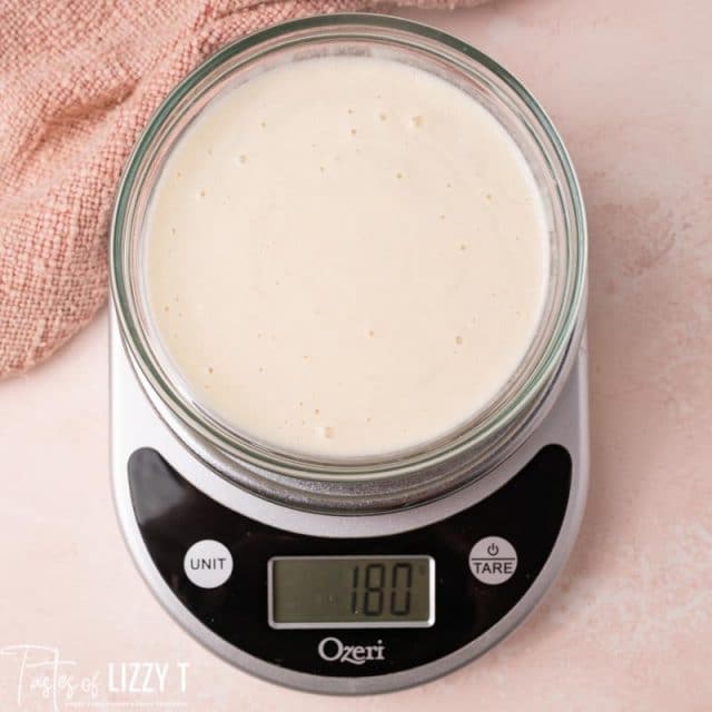 sourdough discard in a bowl on a kitchen scale