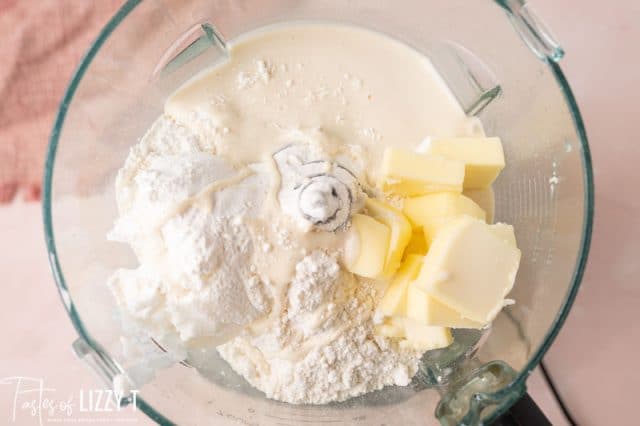 ingredients for sourdough pie crust in a food processor