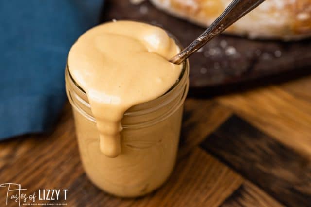 overflowing jar of amish peanut butter spread