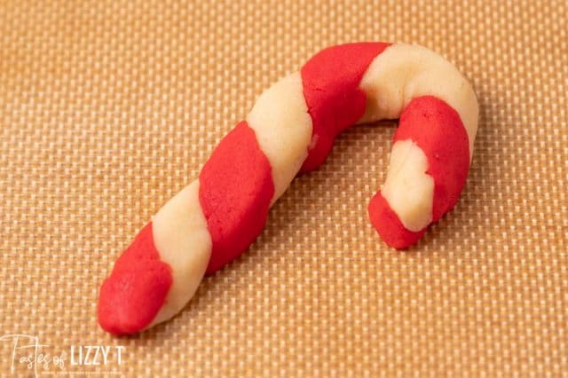 an unbaked candy cane cookie