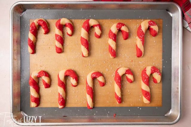 unbaked cookies on a baking mat