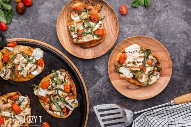 overhead view of plated caprese chicken pizza