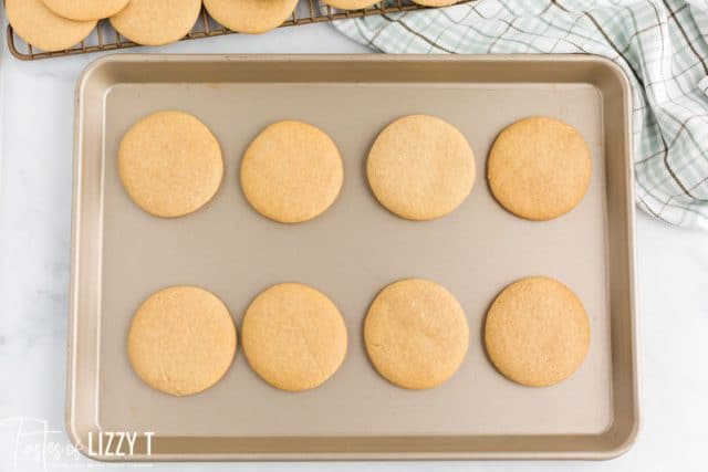 cut out cookies on a baking sheet