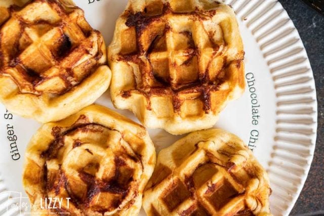 overhead view of 4 waffles on a plate