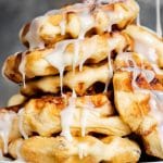 tall stack of glazed cinnamon roll waffles