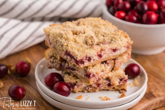 stack of 3 cranberry cream cheese bars on a plate