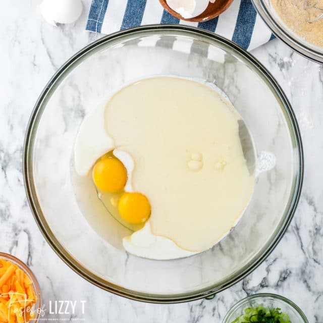 eggs, milk and oil in a bowl