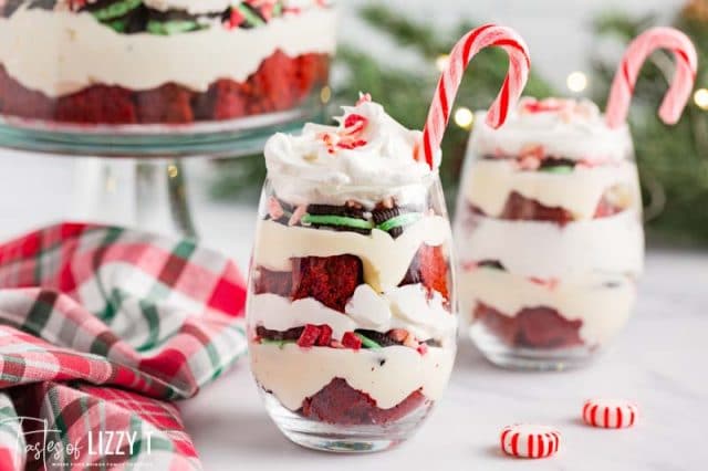 two glasses of peppermint trifles with candy canes