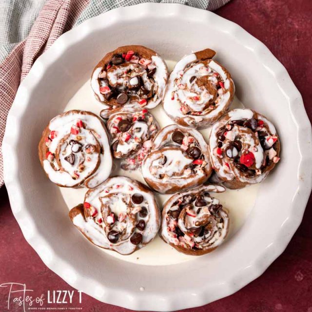 heavy cream poured over unbaked sweet rolls