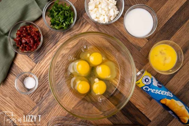 ingredients for roasted tomato and feta egg souffle on a table