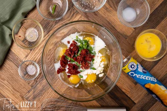 unmixed egg mixture for roasted tomato egg souffle on a table