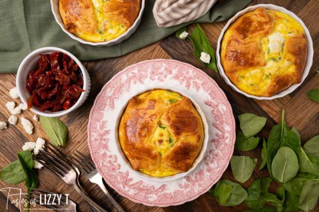 egg souffles with spinach on a table