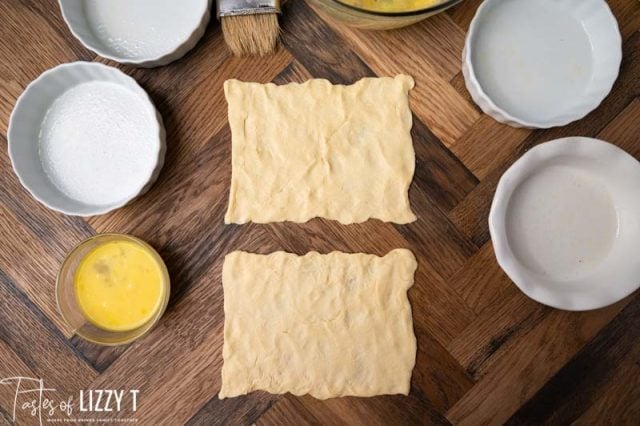 pressed out crescent rolls on a table