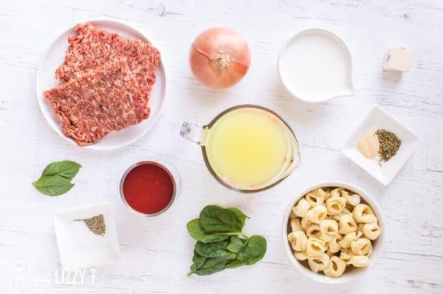 ingredients for tortellini soup on a table